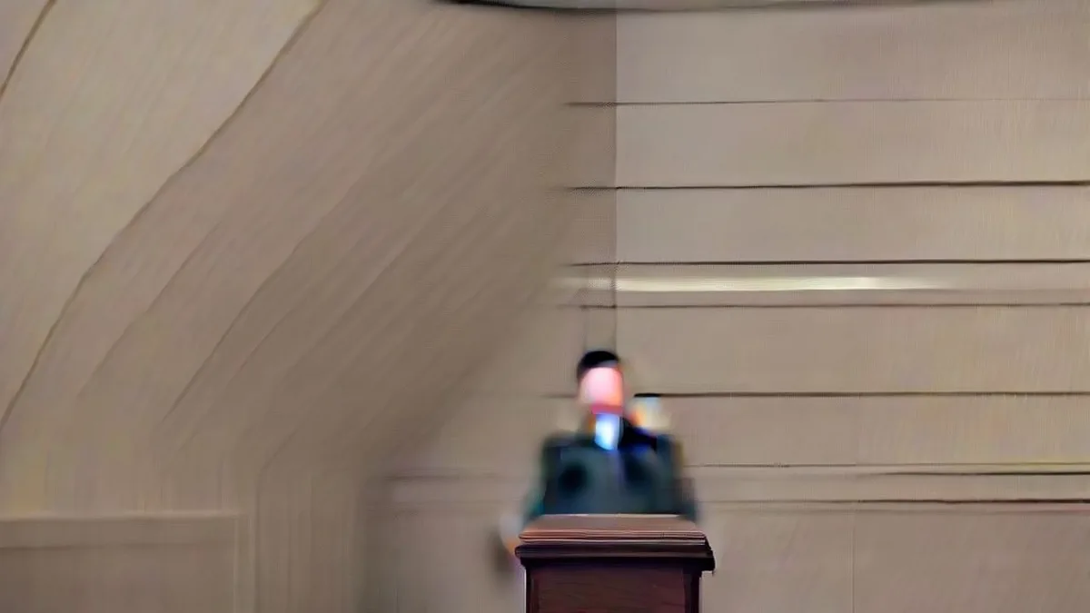 A formal briefing lectern in a government press room setting during economic policy remarks.