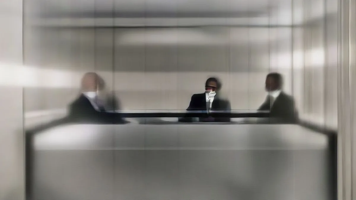 Financial executives seated in a corporate boardroom during an institutional investor meeting.