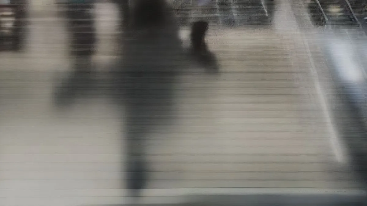 Traders on a financial exchange floor during morning market activity