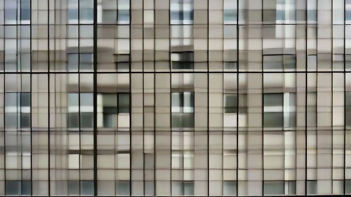 Corporate glass office buildings with business professionals walking outside on a bright day