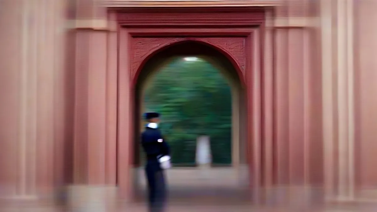 Security personnel standing outside a brick university building on a campus walkway.
