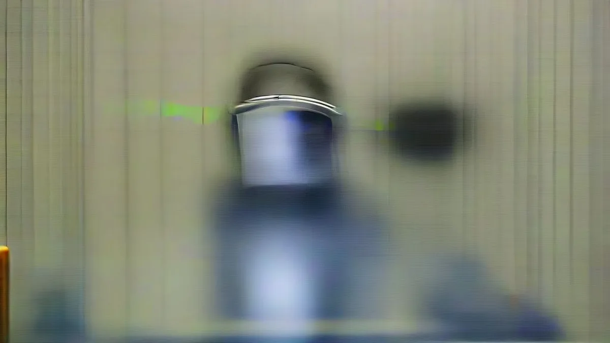 A technician inspecting precision hardware in an industrial manufacturing setting