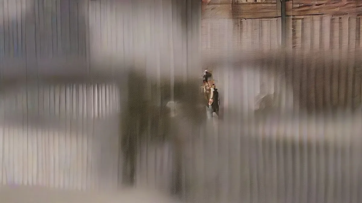 Exterior view of a high-security court complex in New Delhi with police personnel outside