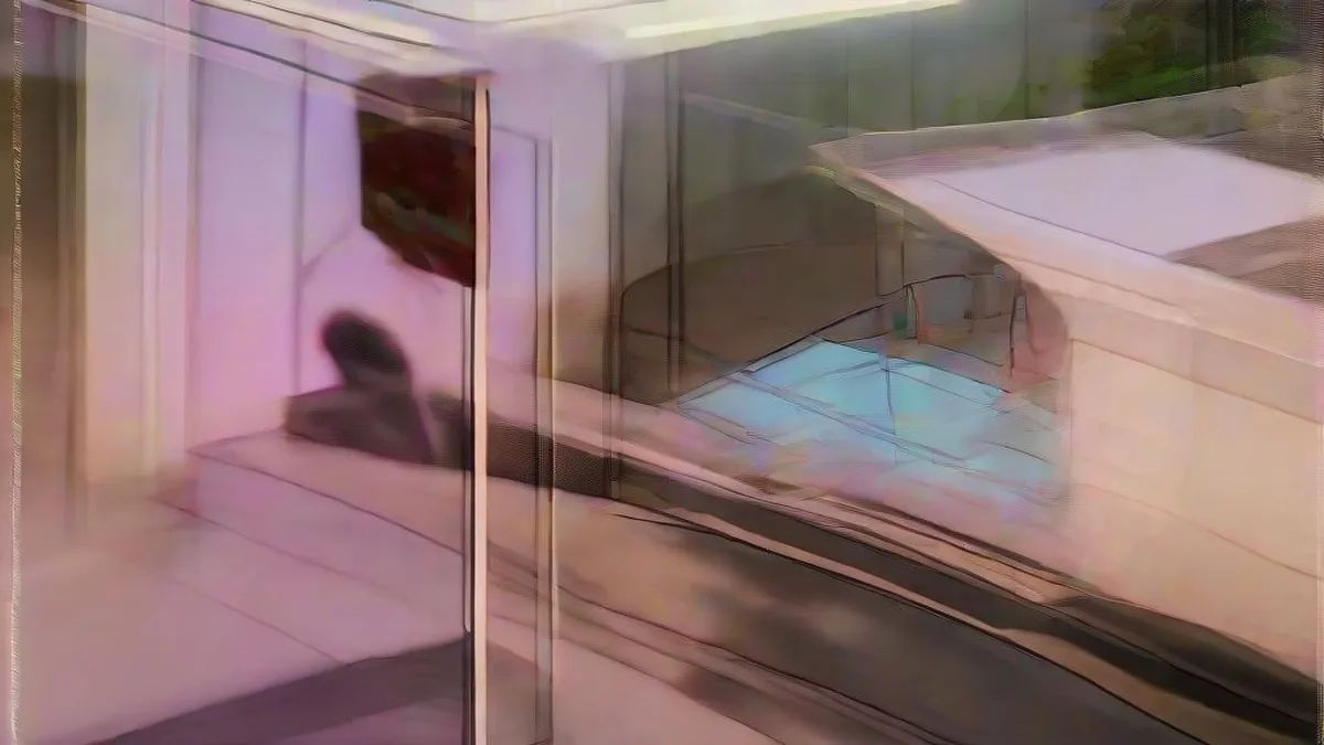 A vehicle waiting at an evening drive-thru service window receiving an order