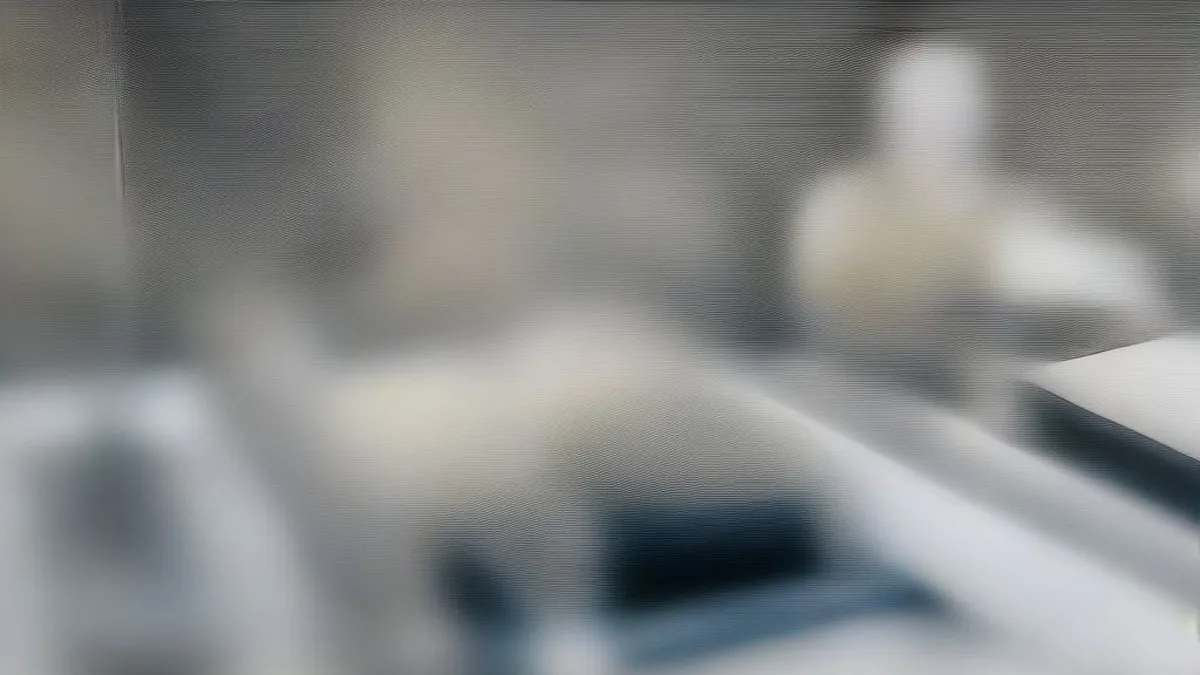Engineers working on an advanced industrial assembly line alongside robotic manufacturing equipment