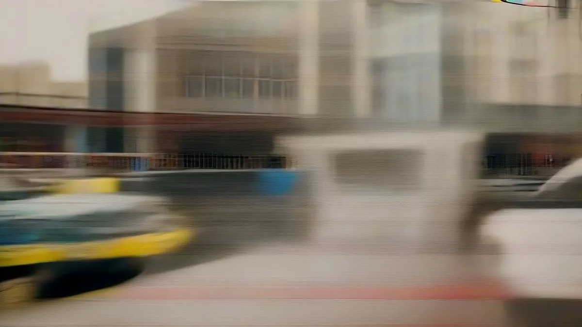 Police patrol vehicle and cordoned street in an Indian city during an active criminal investigation.