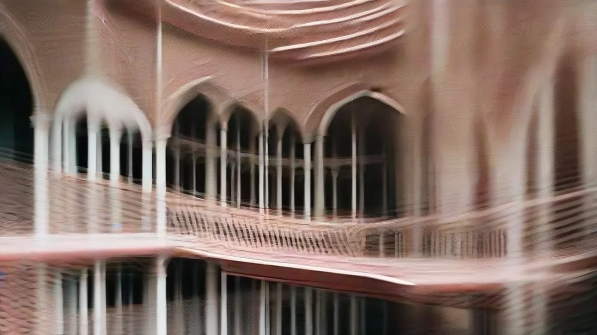 Exterior view of the Madras High Court with advocates walking through the corridor