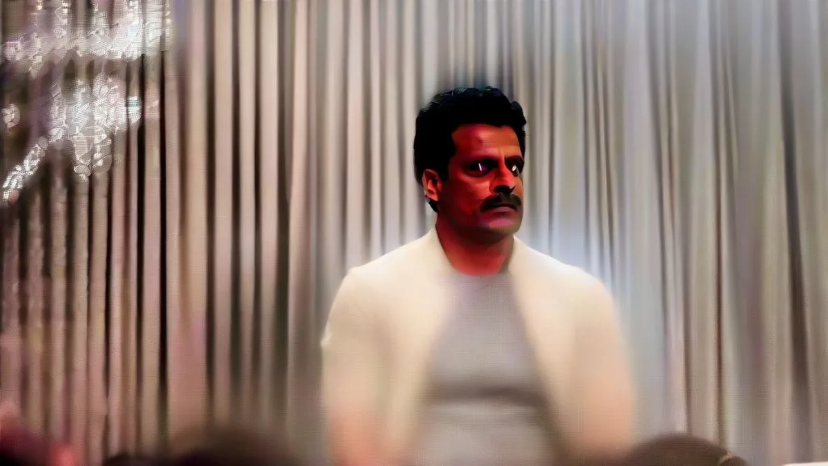 Actor Manoj Bajpayee speaking thoughtfully during a press interaction