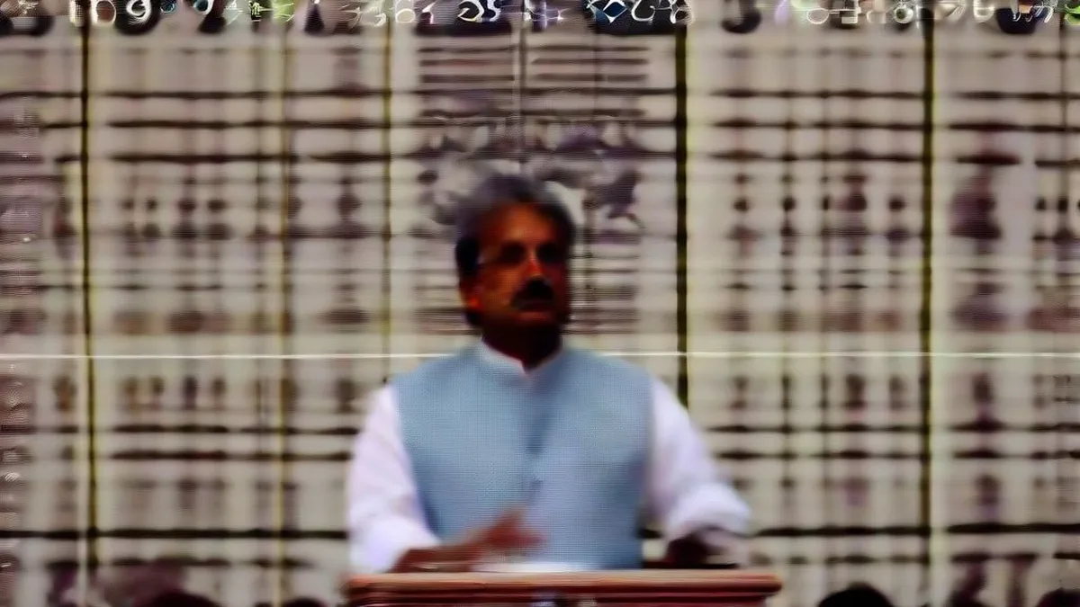 An Indian political leader speaking into microphones during a press conference