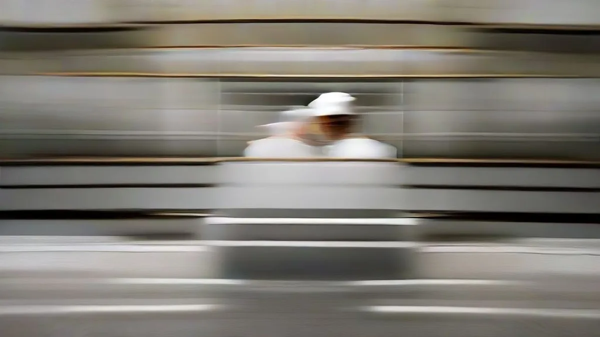 Workers supervising an industrial food packaging line in a modern processing plant