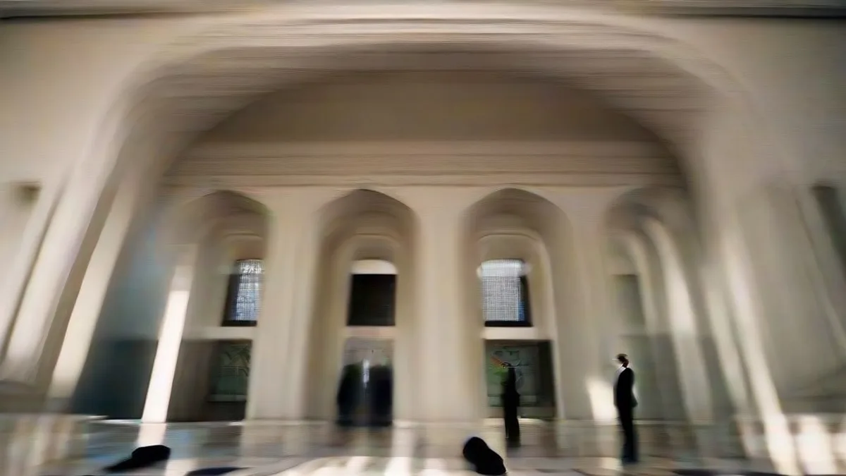 Corridor of an Indian High Court with lawyers walking in natural sunlight