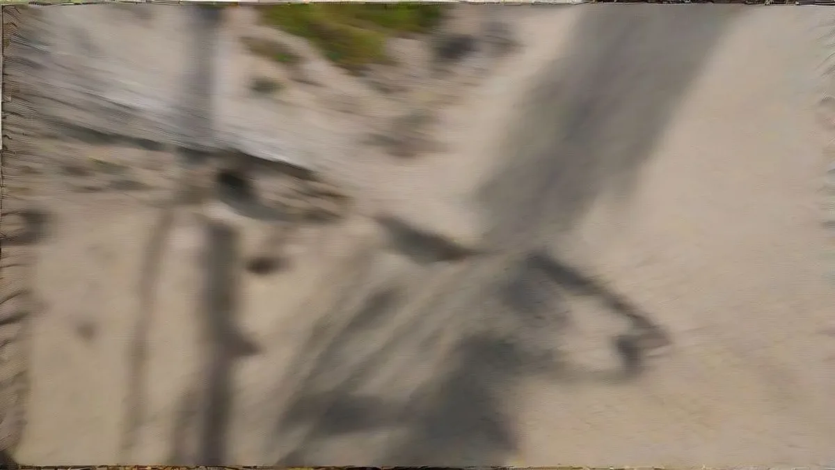 An isolated concrete bridge terminating abruptly into dirt fields without approach roads in rural India