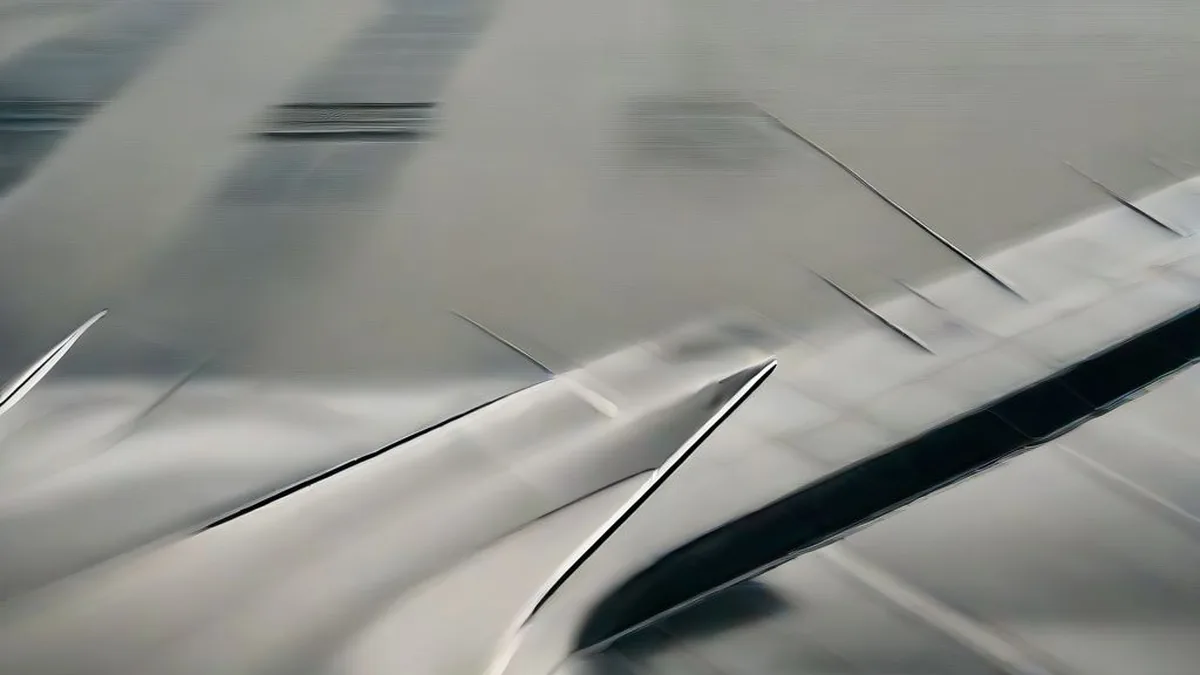 Automotive manufacturing plant exterior with corporate executives walking along an industrial walkway